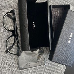 Prada eye glasses. 53•17 and 140 length. New case. Like new glasses.